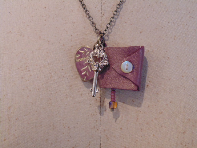 Pink gold mini book pendant necklace